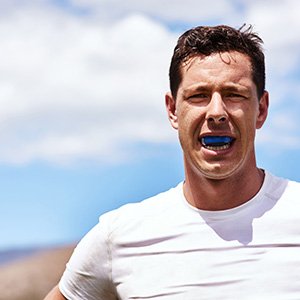 Man wears athletic mouthguard?