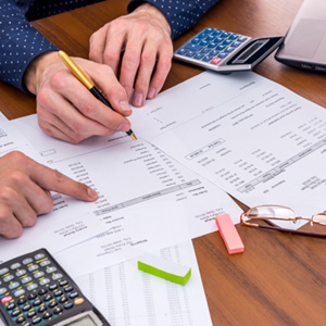 Patient in Idaho Falls filling out forms with dentist